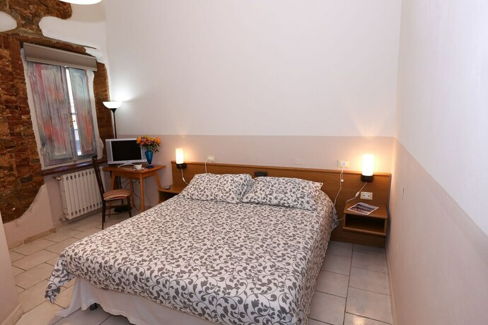 Imagen de la habitación del Hotel Albergo Livorno. Foto 18