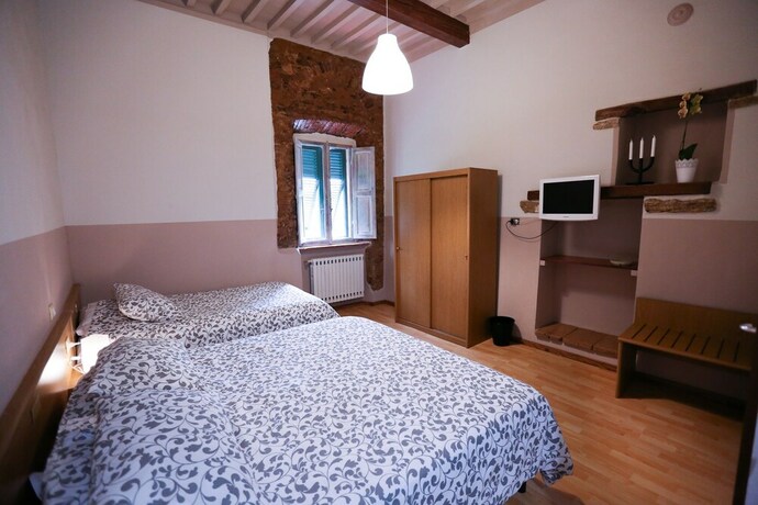Imagen de la habitación del Hotel Albergo Livorno. Foto 19