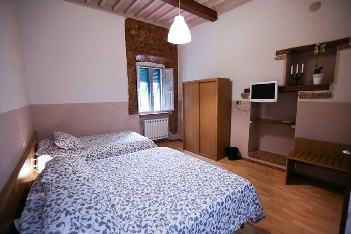 Imagen de la habitación del Hotel Albergo Livorno. Foto 20