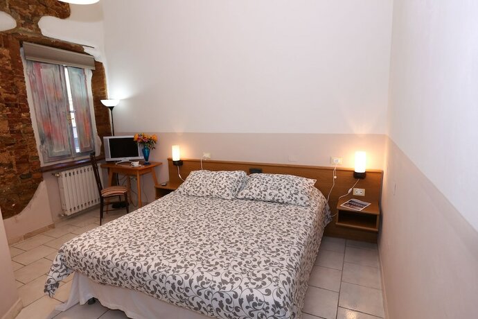 Imagen de la habitación del Hotel Albergo Livorno. Foto 22
