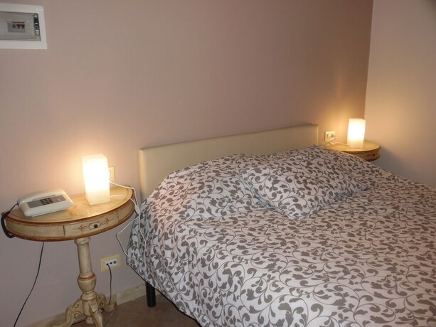 Imagen de la habitación del Hotel Albergo Livorno. Foto 23