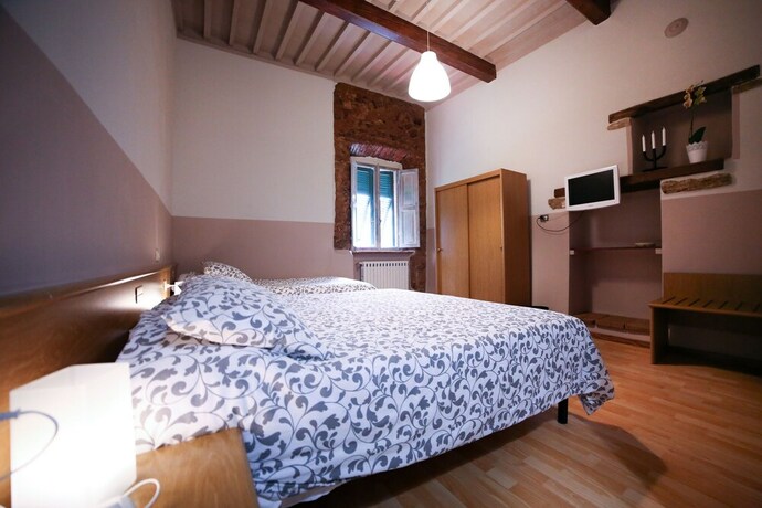 Imagen de la habitación del Hotel Albergo Livorno. Foto 25