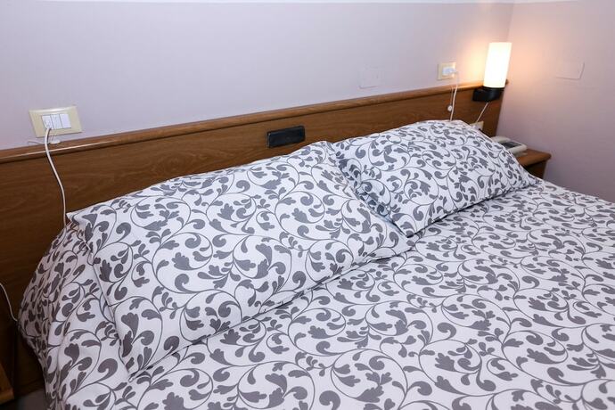 Imagen de la habitación del Hotel Albergo Livorno. Foto 28
