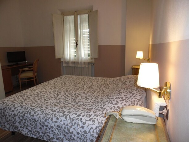 Imagen de la habitación del Hotel Albergo Livorno. Foto 30