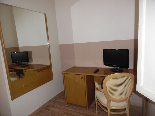 Imagen de la habitación del Hotel Albergo Livorno. Foto 31