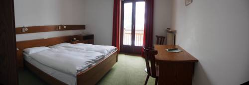 Imagen de la habitación del Hotel Albergo Majarei. Foto 13