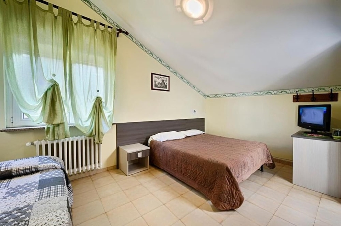 Imagen de la habitación del Hotel Albergo Mancuso del Voison, Aosta. Foto 2