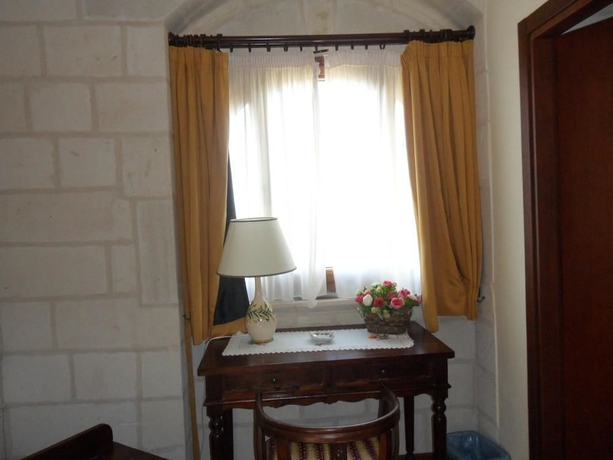 Imagen de la habitación del Hotel Albergo Masseria Gattamora. Foto 16