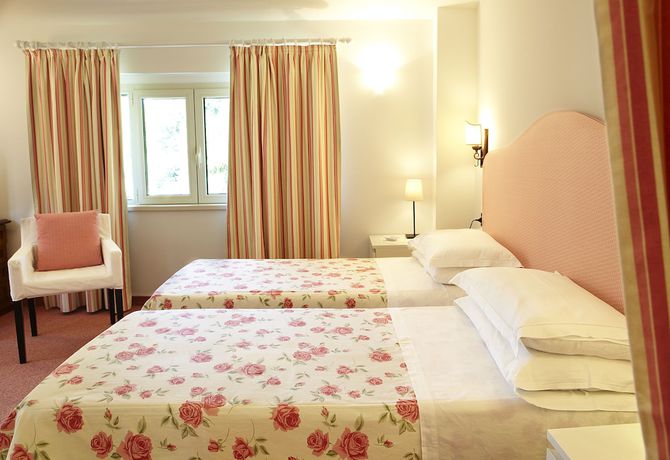 Imagen de la habitación del Hotel Albergo Milano, Lanzo d`Intelvi. Foto 17