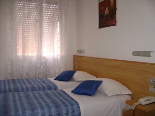 Imagen de la habitación del Hotel Albergo Moderno, Modena. Foto 12