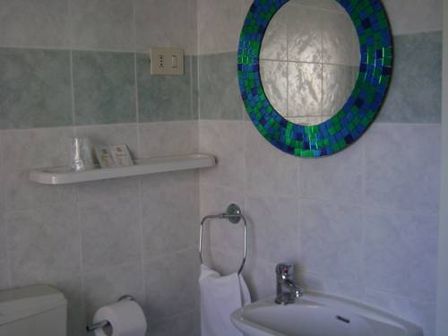 Imagen de la habitación del Hotel Albergo Moderno, Modena. Foto 16