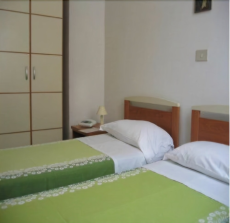 Imagen de la habitación del Hotel Albergo Natucci. Foto 7