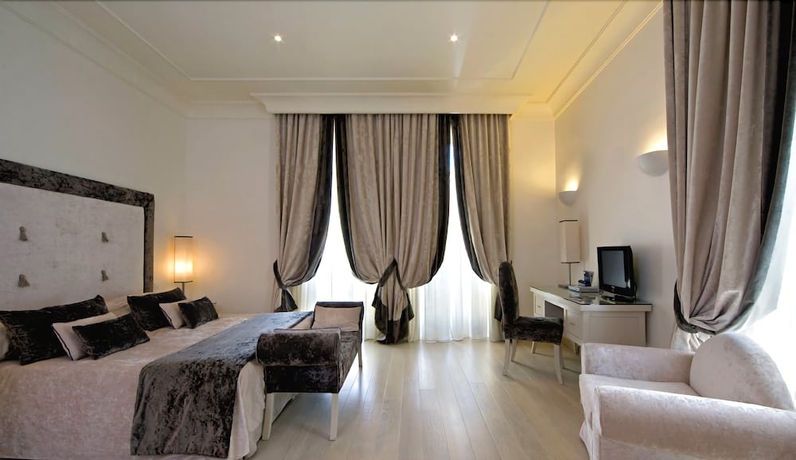 Imagen de la habitación del Hotel Albergo Palazzo Decumani. Foto 3