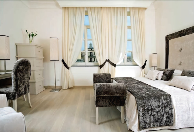 Imagen de la habitación del Hotel Albergo Palazzo Decumani. Foto 4