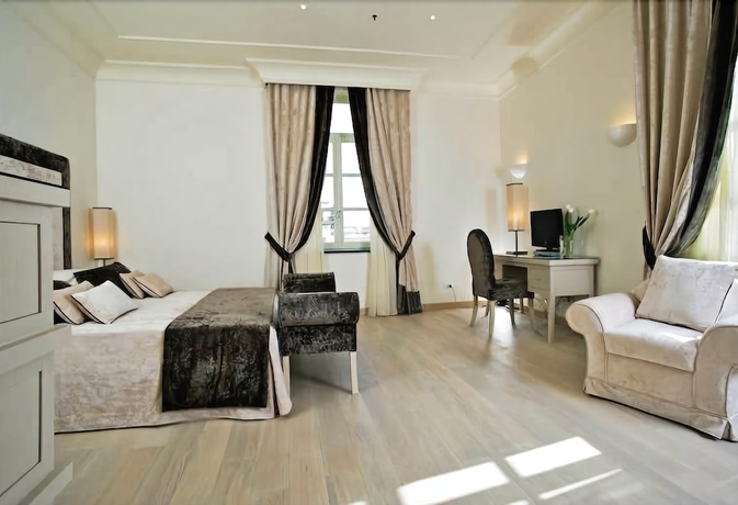 Imagen de la habitación del Hotel Albergo Palazzo Decumani. Foto 9