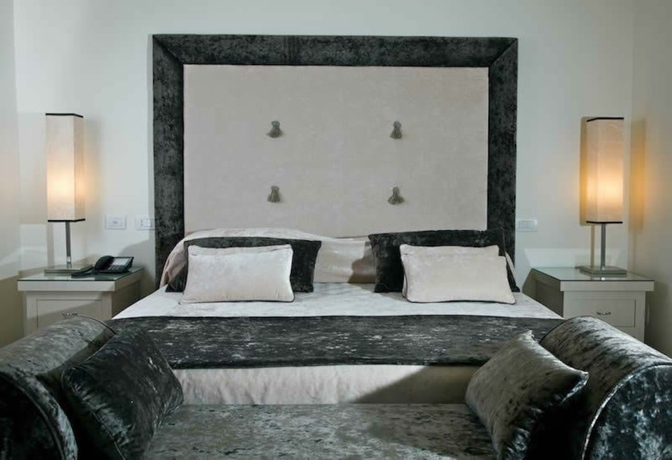 Imagen de la habitación del Hotel Albergo Palazzo Decumani. Foto 10