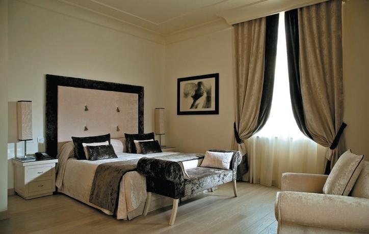 Imagen de la habitación del Hotel Albergo Palazzo Decumani. Foto 13