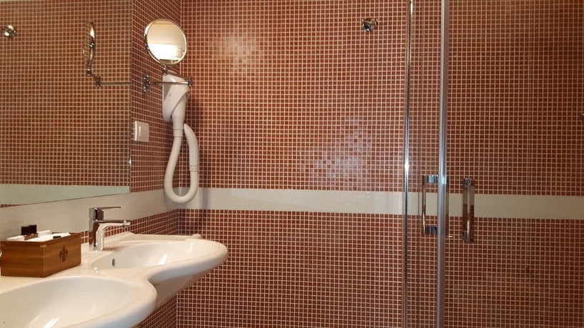Imagen de la habitación del Hotel Albergo Palazzo Lodron Bertelli. Foto 9