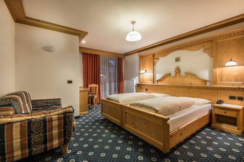 Imagen de la habitación del Hotel Albergo Posta Pederoa. Foto 5