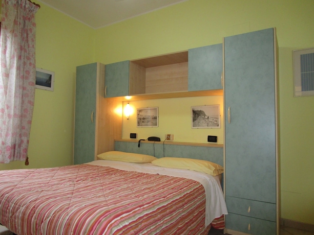 Imagen de la habitación del Hotel Albergo Primavera. Foto 13