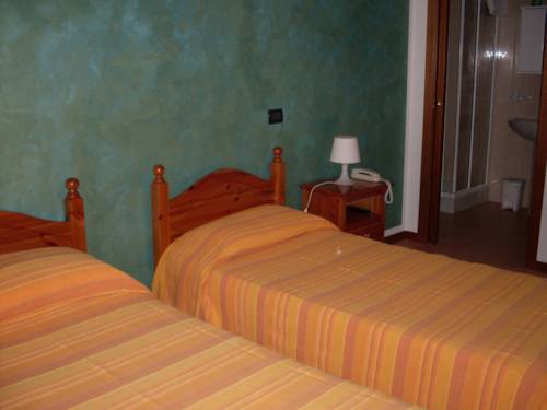 Imagen de la habitación del Hotel Albergo Quattro Pini. Foto 1