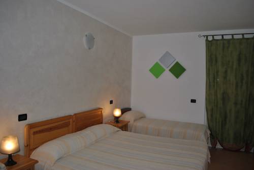 Imagen de la habitación del Hotel Albergo Quattro Pini. Foto 3