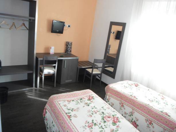 Imagen de la habitación del Hotel Albergo Renato. Foto 17