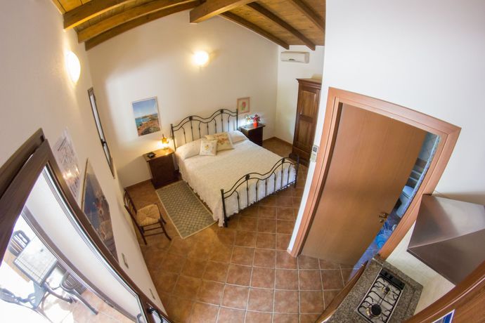 Imagen de la habitación del Hotel Albergo Residenziale Menhirs. Foto 14