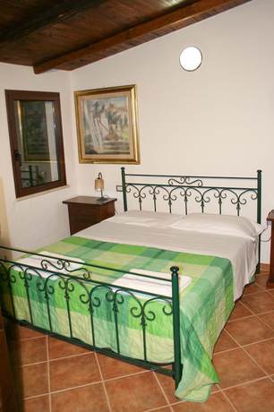 Imagen de la habitación del Hotel Albergo Residenziale Menhirs. Foto 16