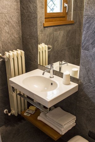 Imagen de la habitación del Hotel Albergo Ristorante Cuccini. Foto 18