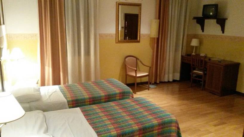 Imagen de la habitación del Hotel Albergo Ristorante Flora. Foto 12