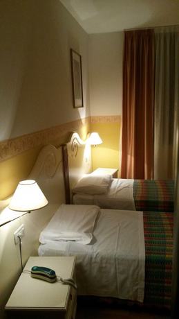Imagen de la habitación del Hotel Albergo Ristorante Flora. Foto 17