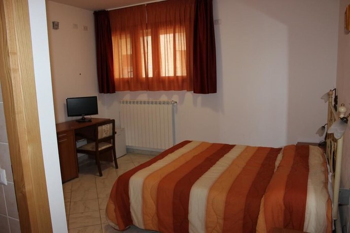 Imagen de la habitación del Hotel Albergo Ristorante La Bocca di Bacco. Foto 6