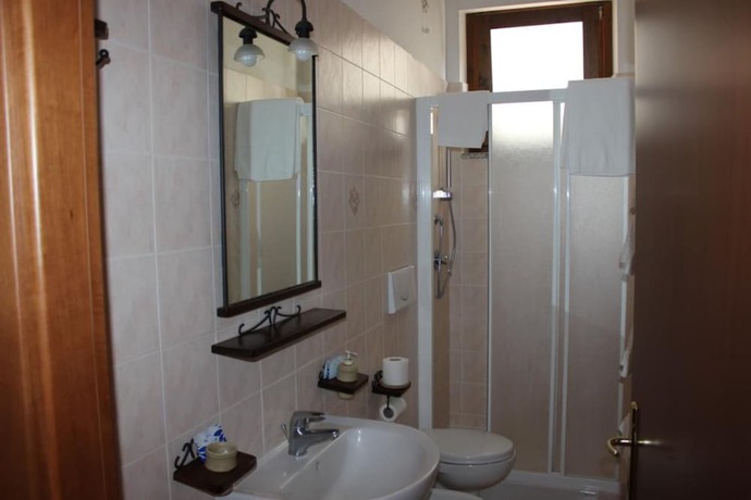 Imagen de la habitación del Hotel Albergo Ristorante La Bocca di Bacco. Foto 7