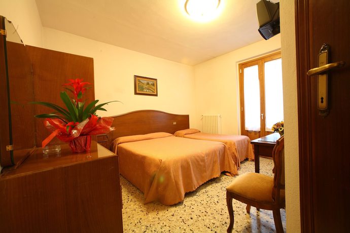 Imagen de la habitación del Hotel Albergo Ristorante il Poggiolo. Foto 9