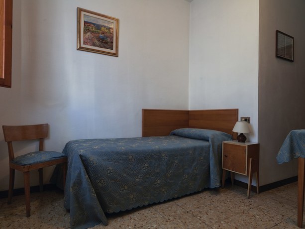 Imagen de la habitación del Hotel Albergo Ristorante il Poggiolo. Foto 11