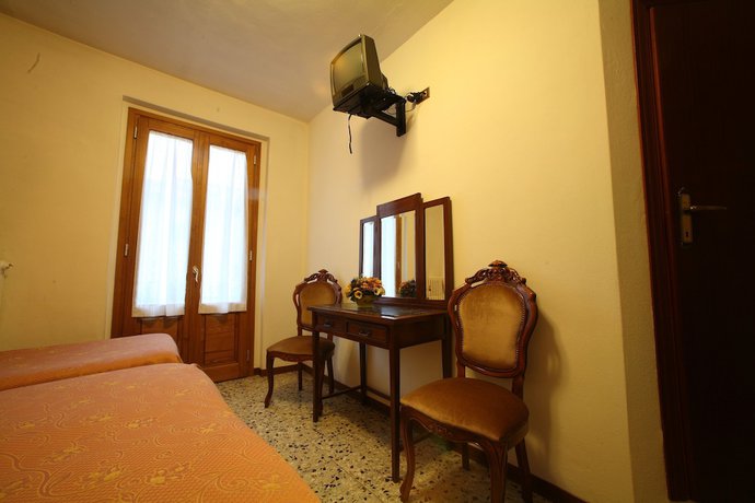 Imagen de la habitación del Hotel Albergo Ristorante il Poggiolo. Foto 13