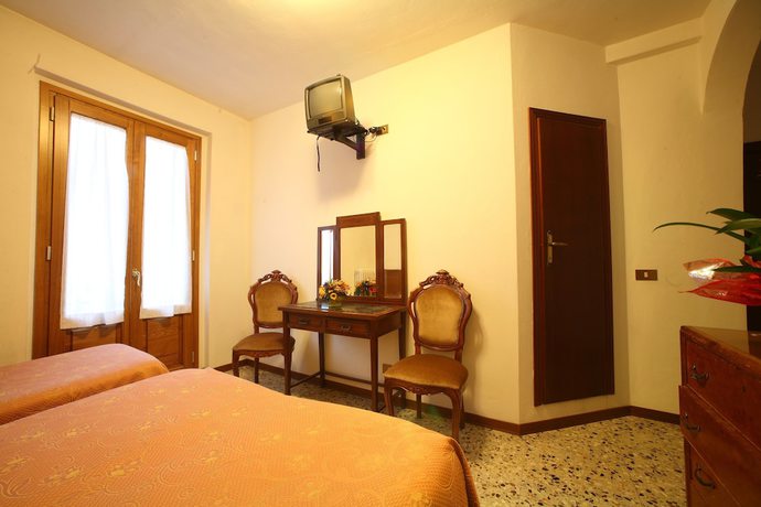 Imagen de la habitación del Hotel Albergo Ristorante il Poggiolo. Foto 14