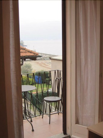 Imagen de la habitación del Hotel Albergo Riva. Foto 17