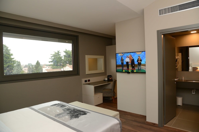 Imagen de la habitación del Hotel Albergo Roma, Bw Signature Collection. Foto 9