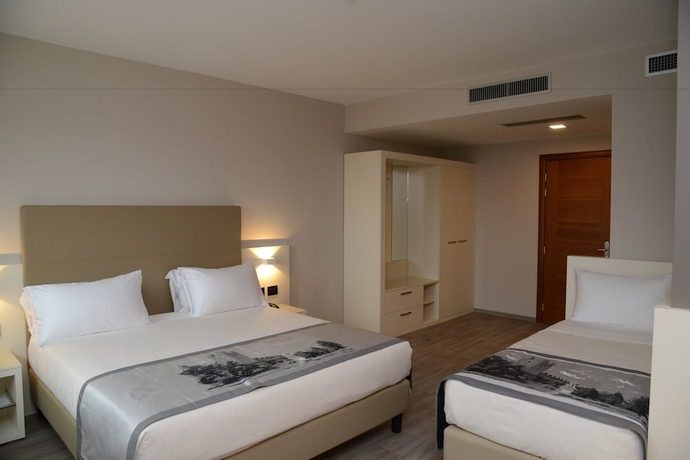 Imagen de la habitación del Hotel Albergo Roma, Bw Signature Collection. Foto 10