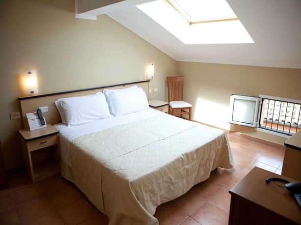 Imagen de la habitación del Hotel Albergo Rossini 1936 Small and Charming. Foto 5