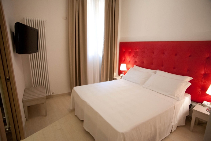 Imagen de la habitación del Hotel Albergo Rossini 1936 Small and Charming. Foto 7