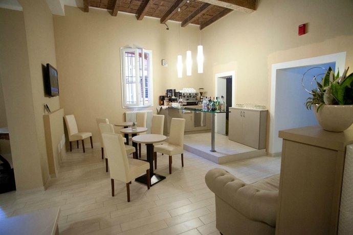 Imagen del bar/restaurante del Hotel Albergo Rossini 1936 Small and Charming. Foto 2