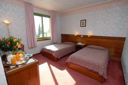 Imagen de la habitación del Hotel Albergo Santa Barbara. Foto 7