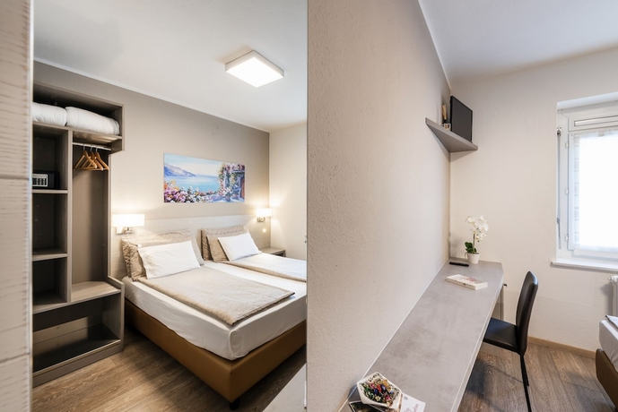 Imagen de la habitación del Hotel Albergo Svizzero. Foto 7