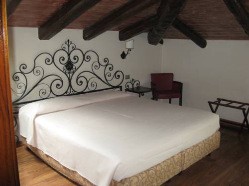 Imagen de la habitación del Hotel Albergo Venturelli. Foto 9