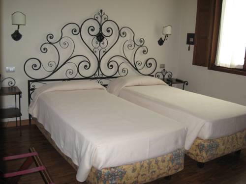 Imagen de la habitación del Hotel Albergo Venturelli. Foto 12