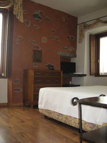 Imagen de la habitación del Hotel Albergo Venturelli. Foto 13