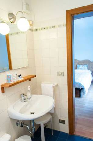 Imagen de la habitación del Hotel Albergo Vezzana. Foto 15